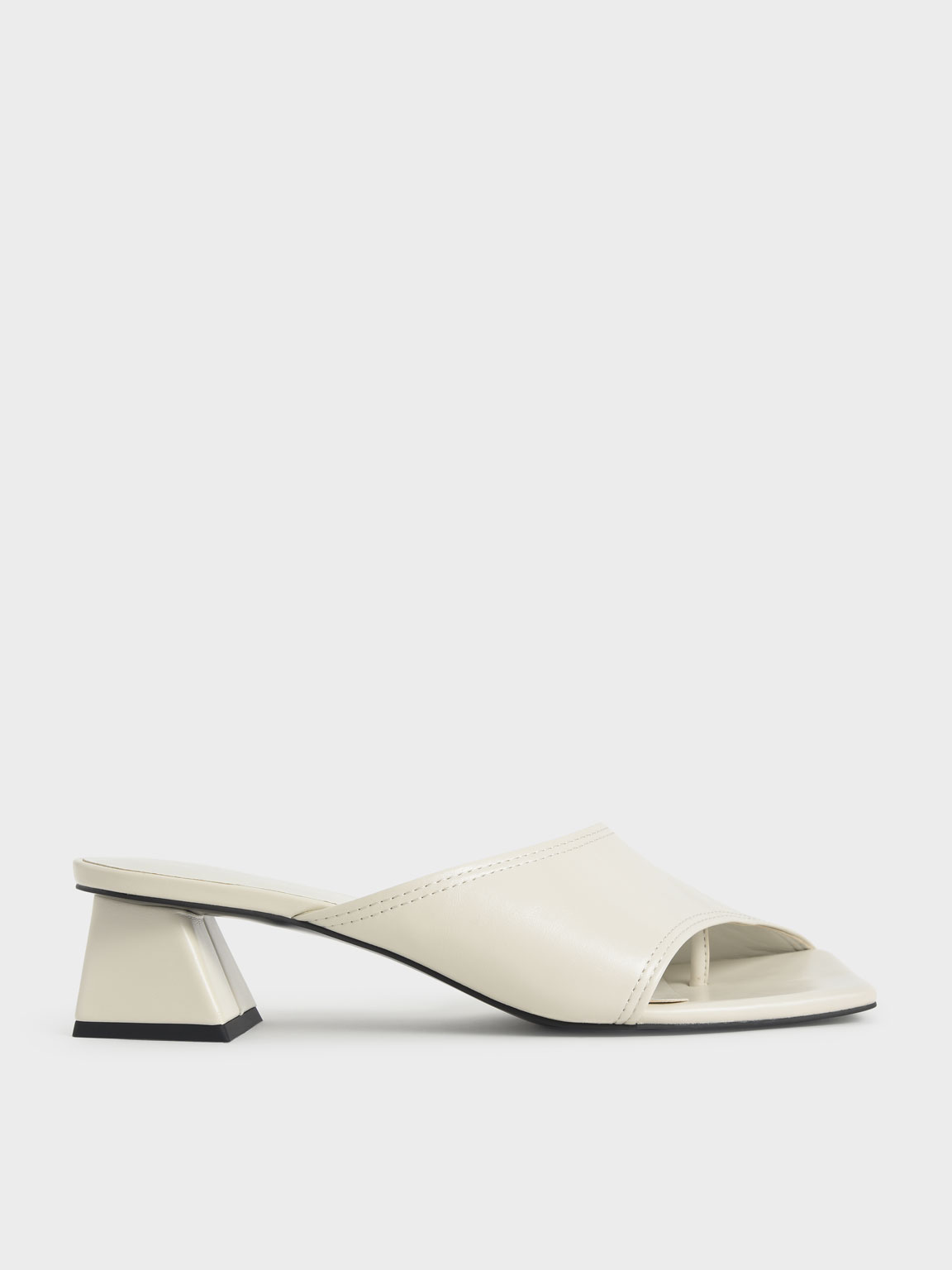 

Trapeze Heel Asymmetric Mules, Chalk