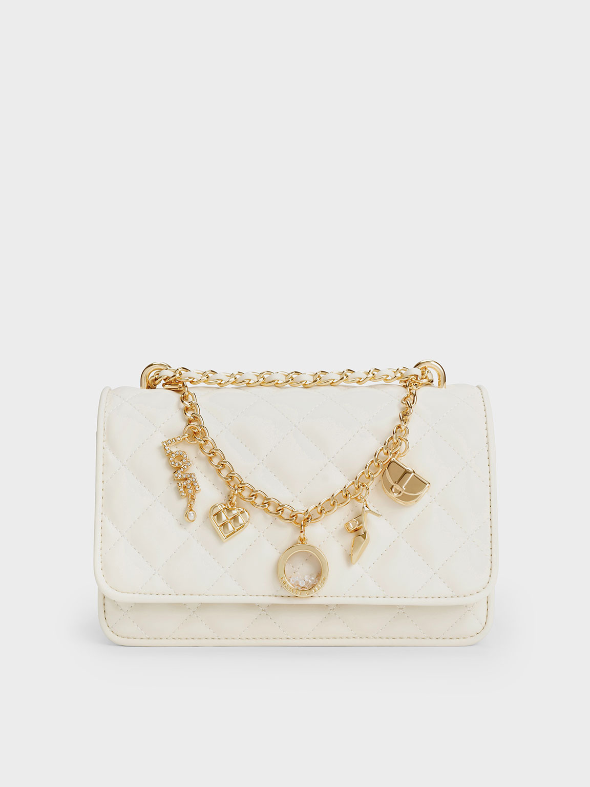 Charles & Keith Charm-embellished Quilted Clutch In Cream
