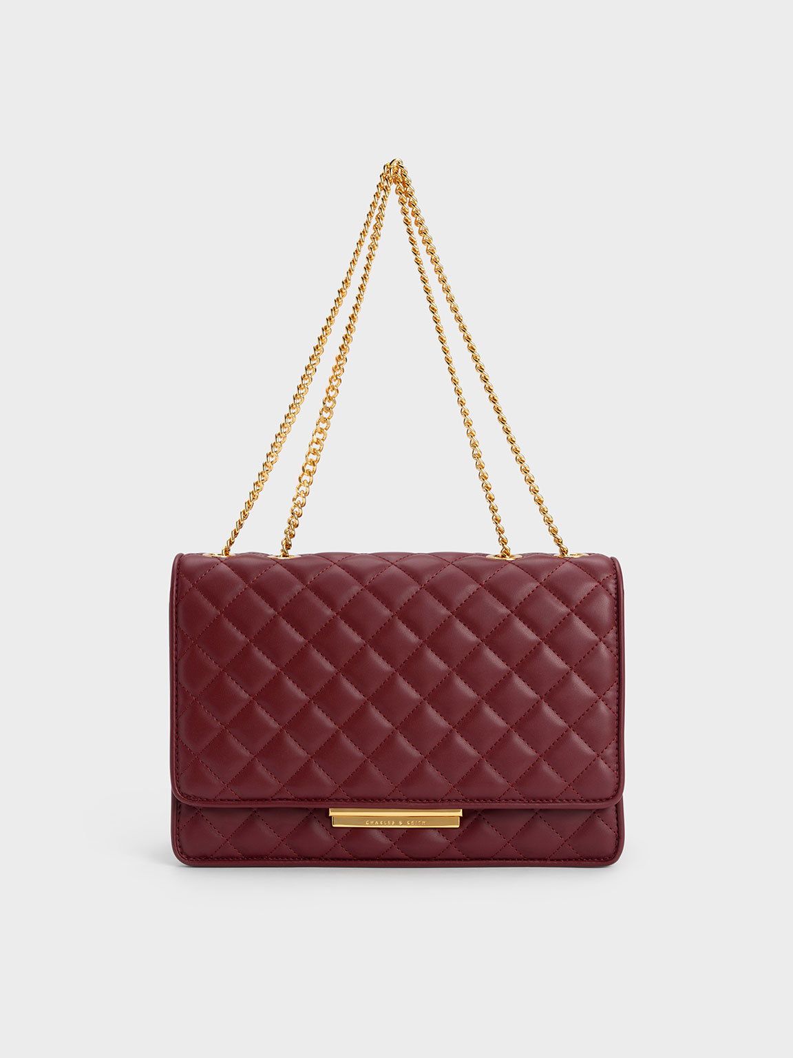 Push-Lock Quilted Crossbody Bag