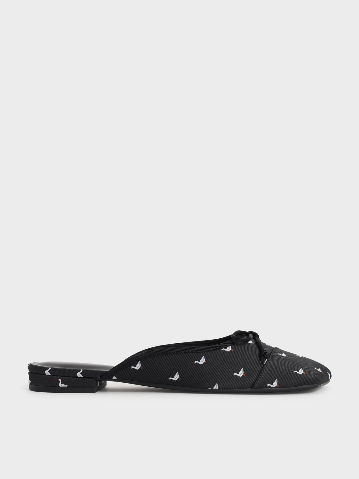 

Printed Jacquard Bow-Tie Flat Mules