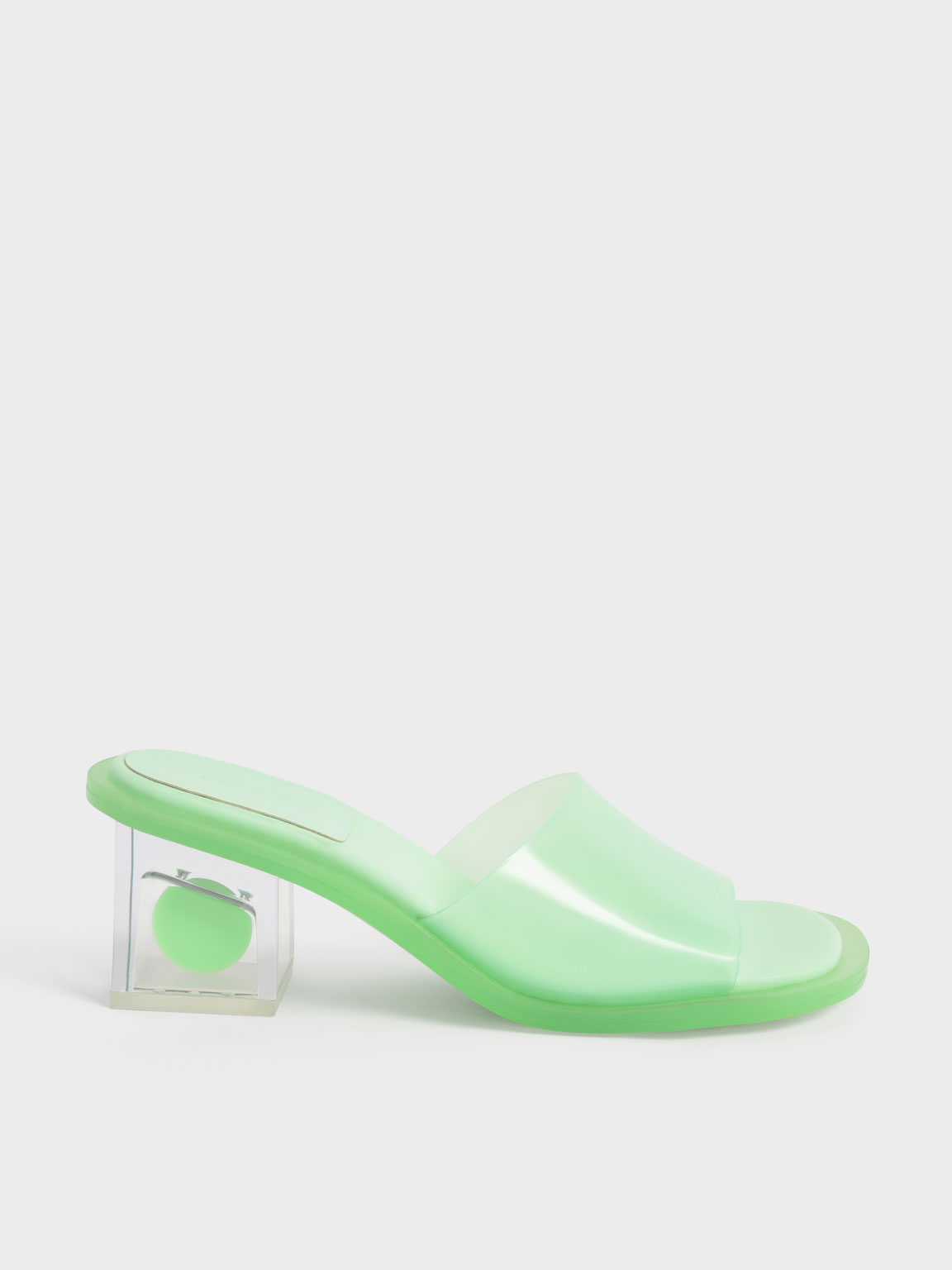 Madison Clear Sculptural Heel Mules