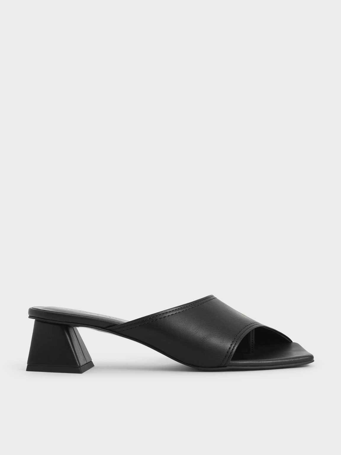 

Trapeze Heel Asymmetric Mules
