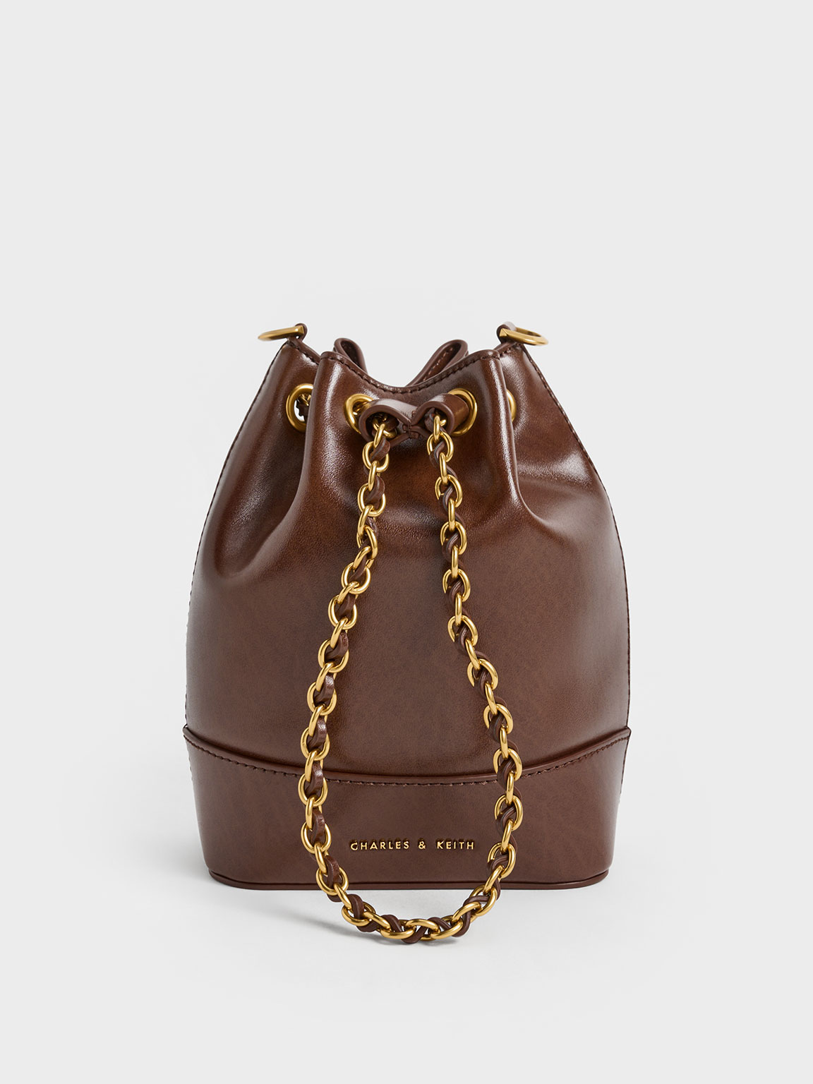 Charles Keith Dancer Drawstring Bucket Bag In Chocolate ModeSens