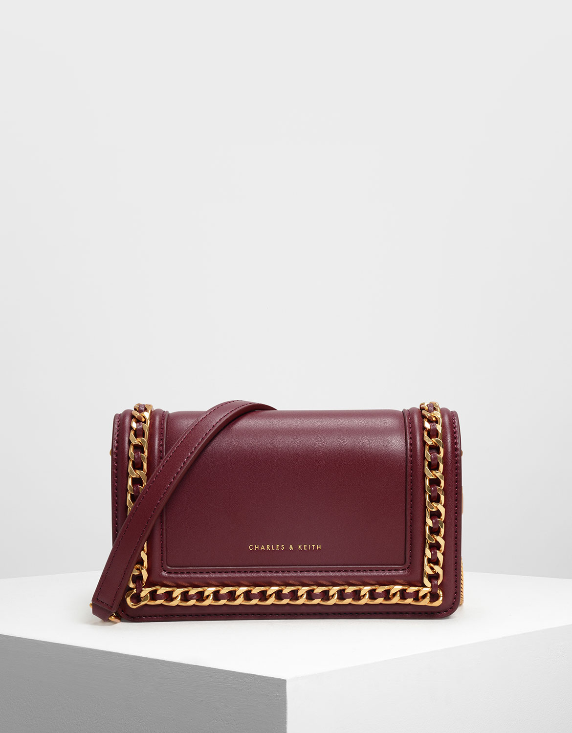 

Chain Rimmed Clutch, Prune