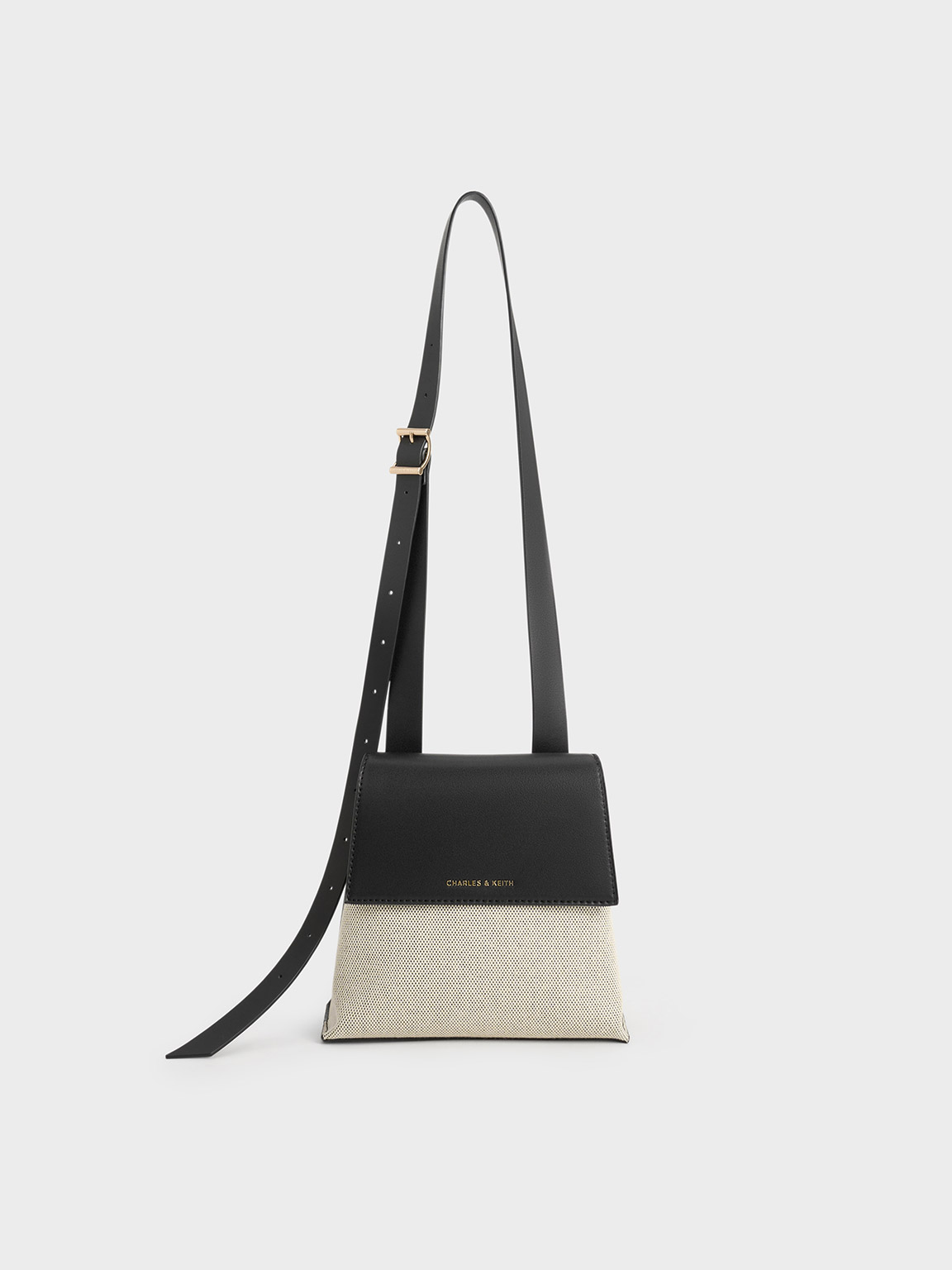 Charles & Keith Marceline Canvas Trapeze Crossbody Bag In Black