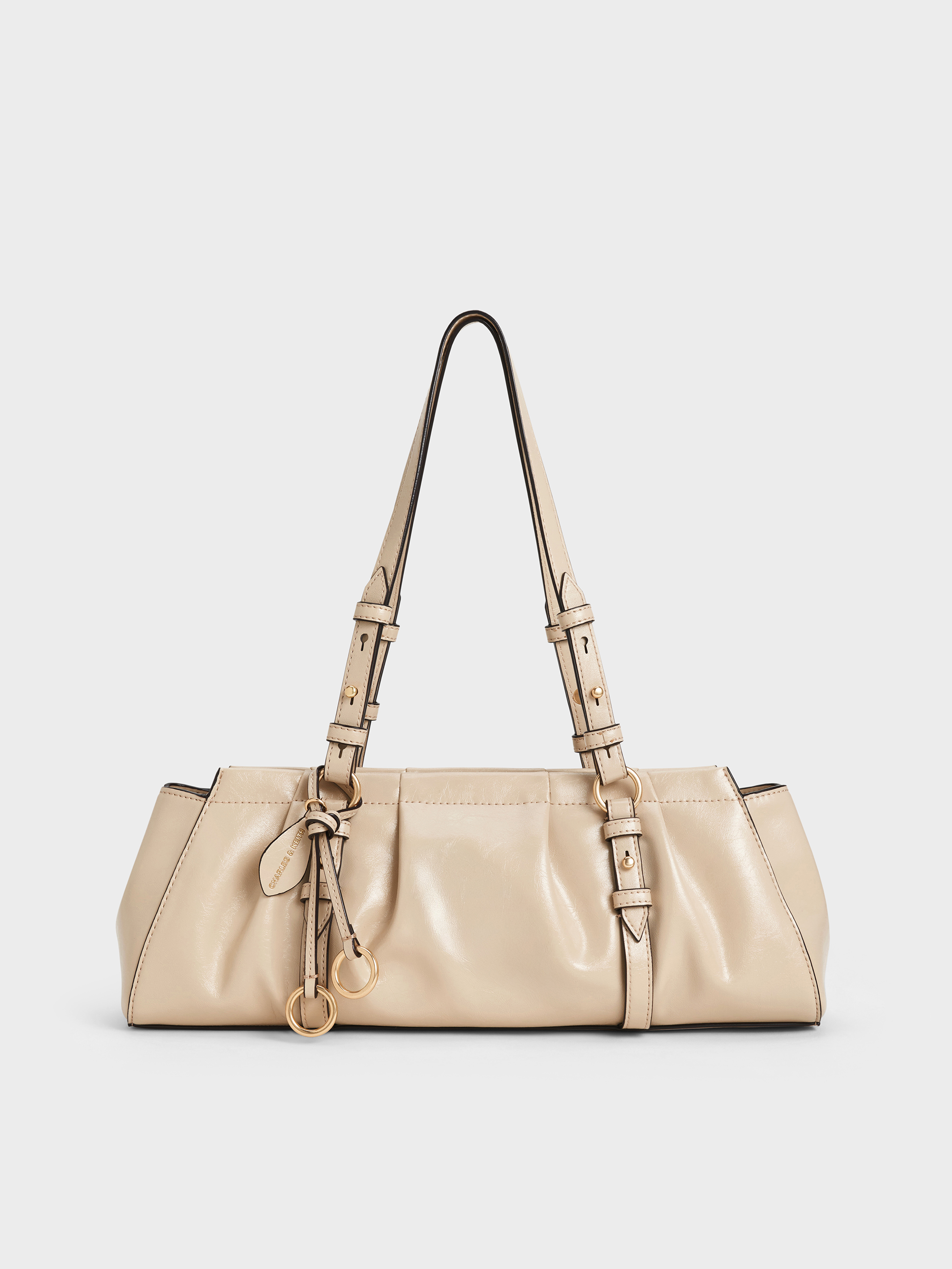 Dusted Oat Britton Ruched Elongated Shoulder Bag | CHARLES & KEITH UK